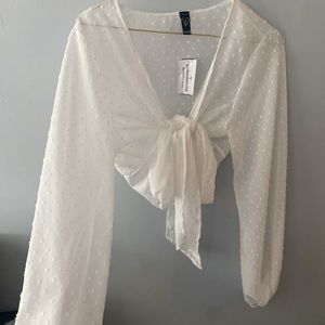 Cropped white blouse.